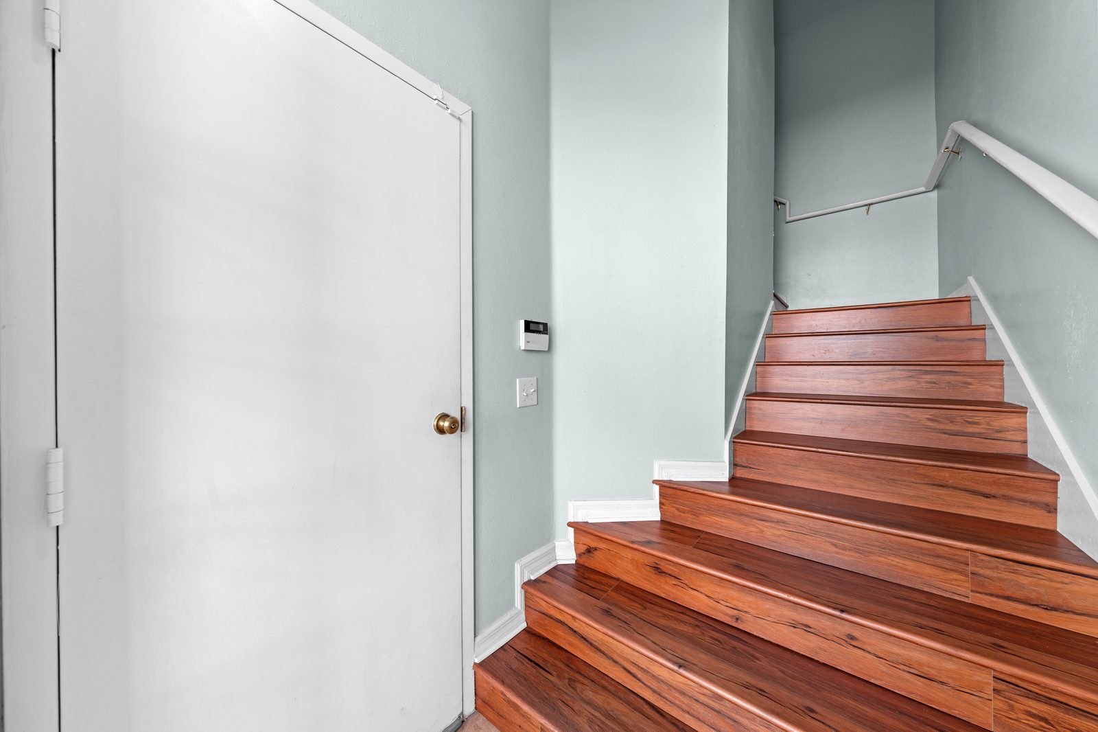 Entry hall with staircase to the main living level