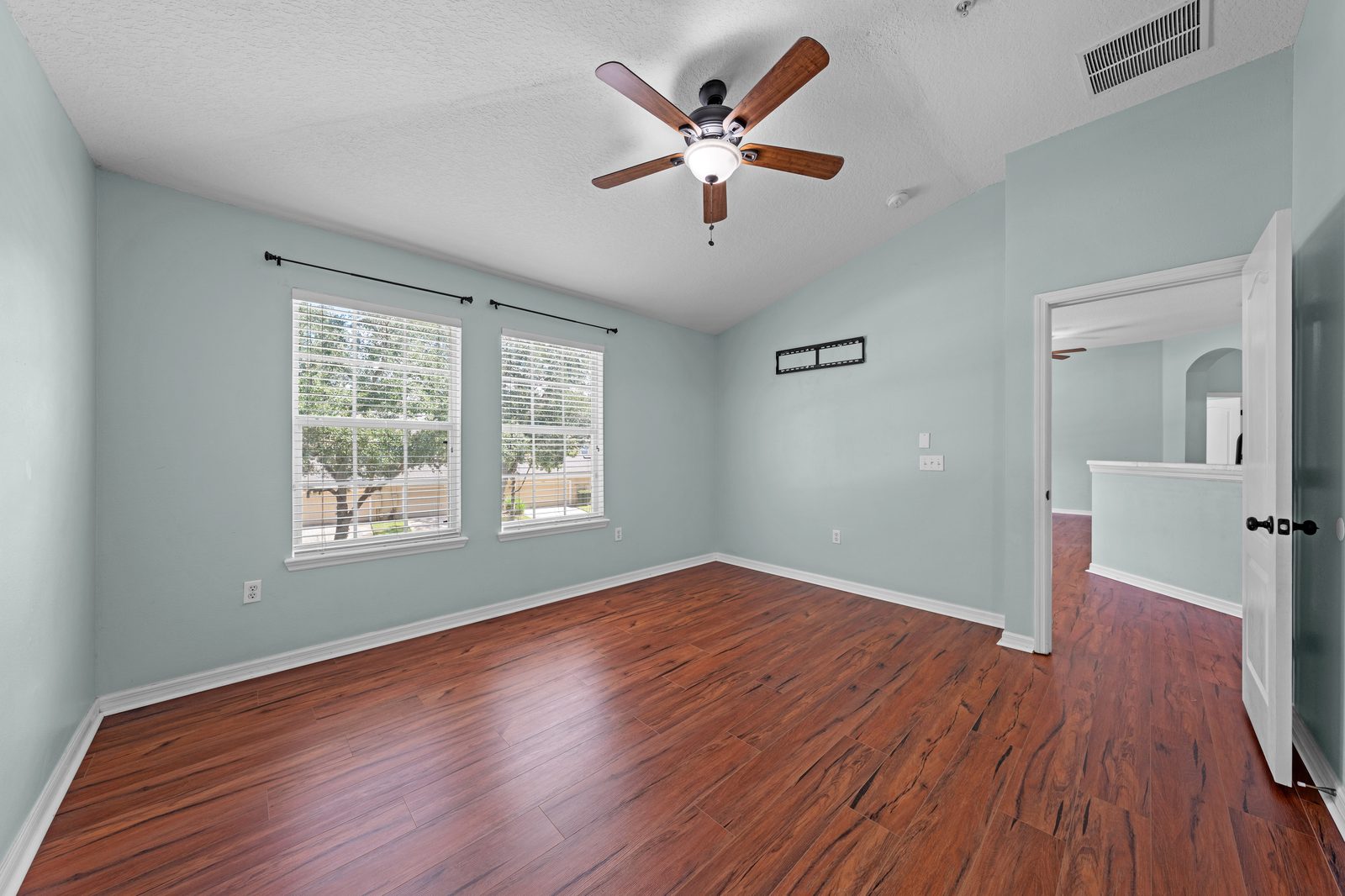 Primary bedroom with ceiling fan