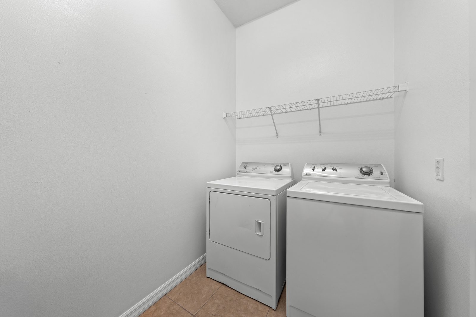 Laundry room with washer and dryer